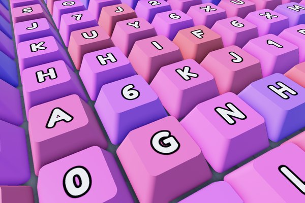 A close-up of KeyCapper keycaps in pink and purple pastel colours, each with a letter or a number on top